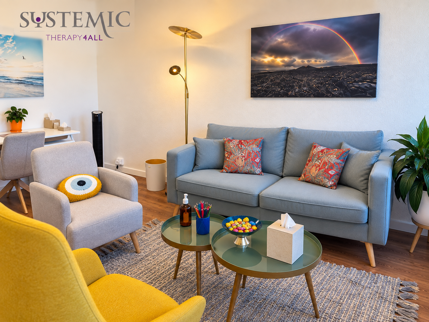 Seating area with sofa, chairs and artwork